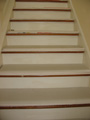 Houston bath protecting stair treads with drywall